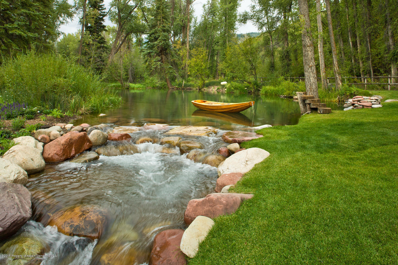 1055 Stage Road Aspen, CO 81611 - Photo 9 of 32 a view of a backyard with sitting area