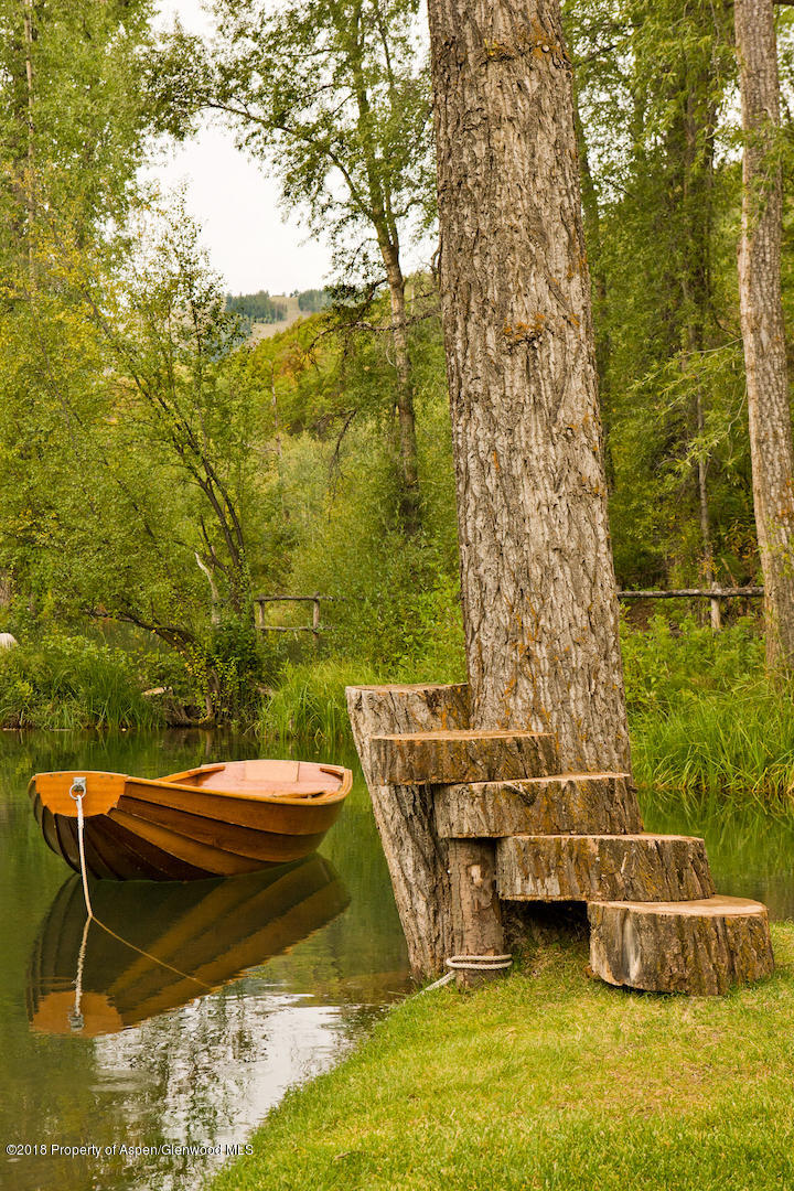 1055 Stage Road Aspen, CO 81611 - Photo 10 of 32 a view of swimming pool with a yard