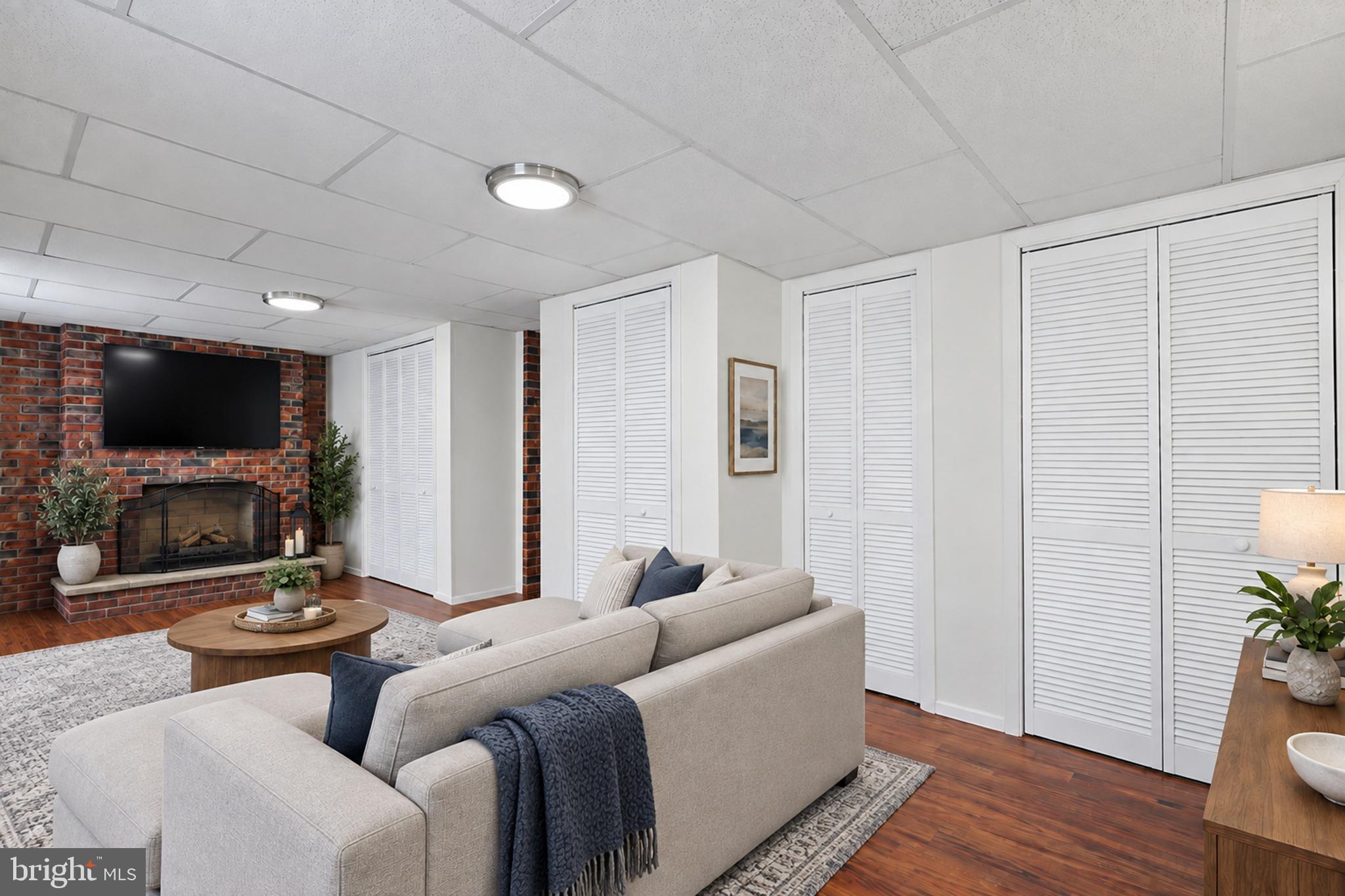 9215 Orbitan Road Baltimore, MD 21234 - Photo 29 of 45 Lower Level Rec Room (Virtually Staged)