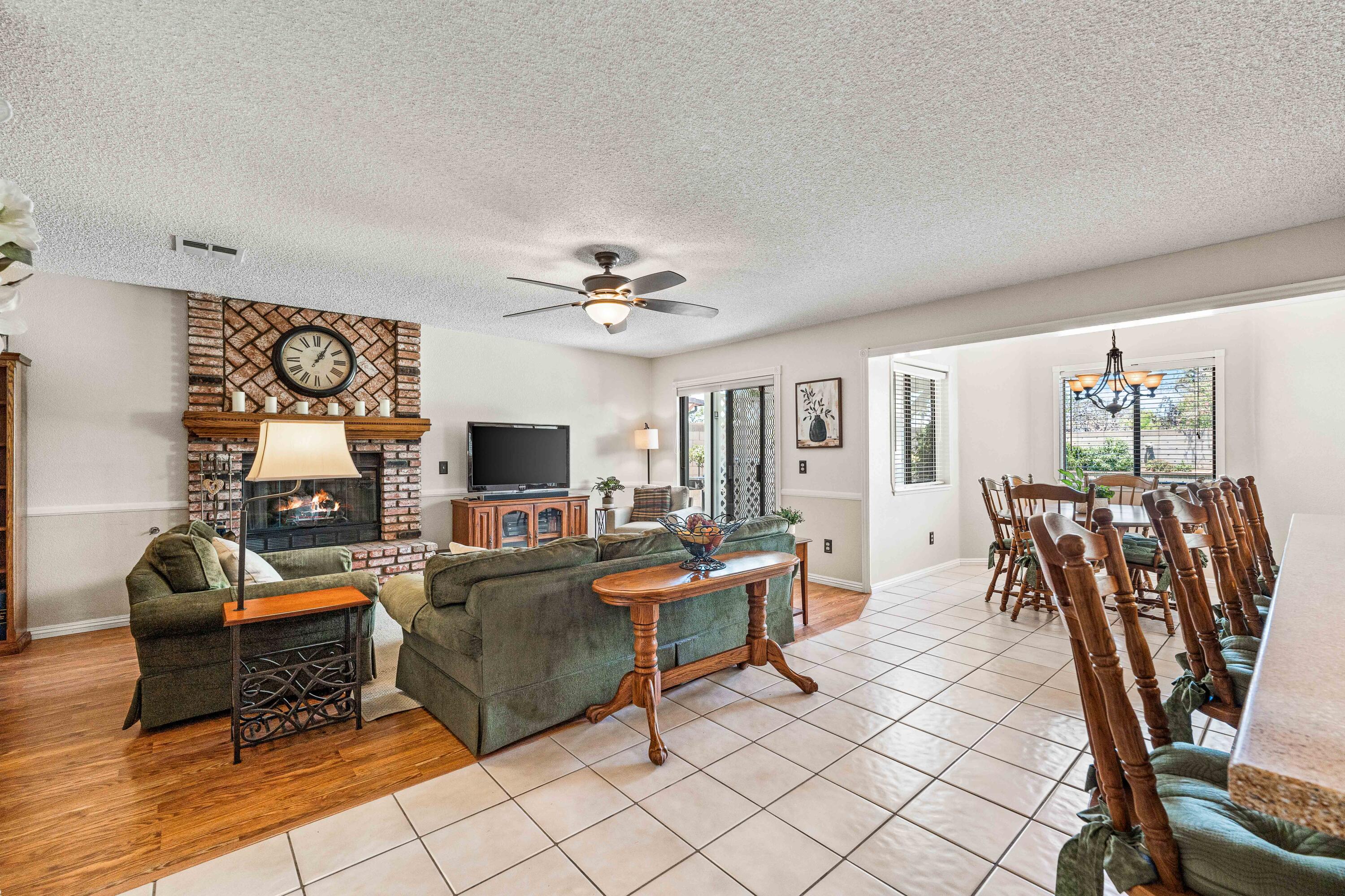 6311 West Ave L12 Lancaster, CA 93536 - Photo 16 of 55 a living room with furniture and a flat screen tv