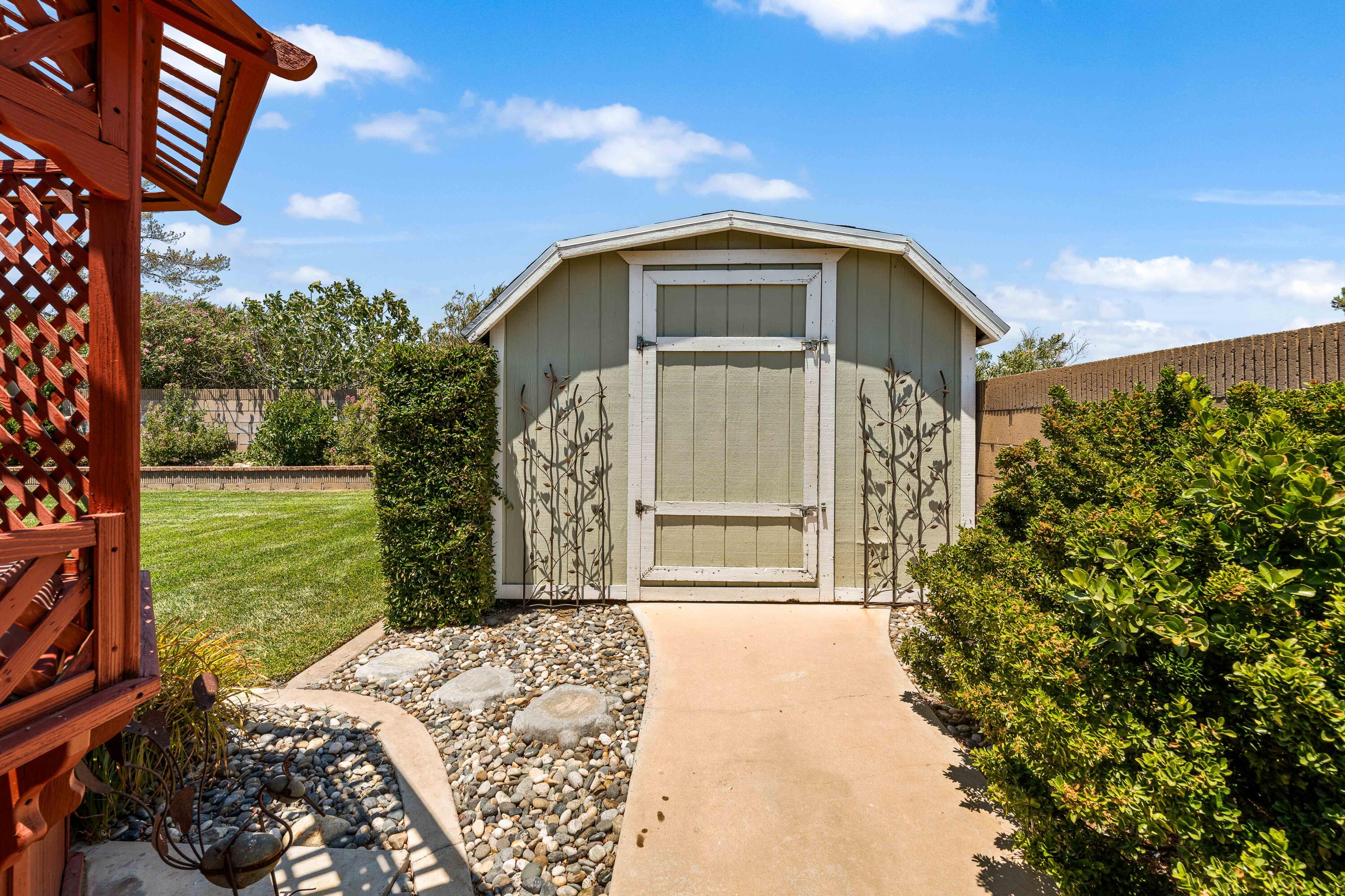 6311 West Ave L12 Lancaster, CA 93536 - Photo 43 of 55 a front view of a house with a yard