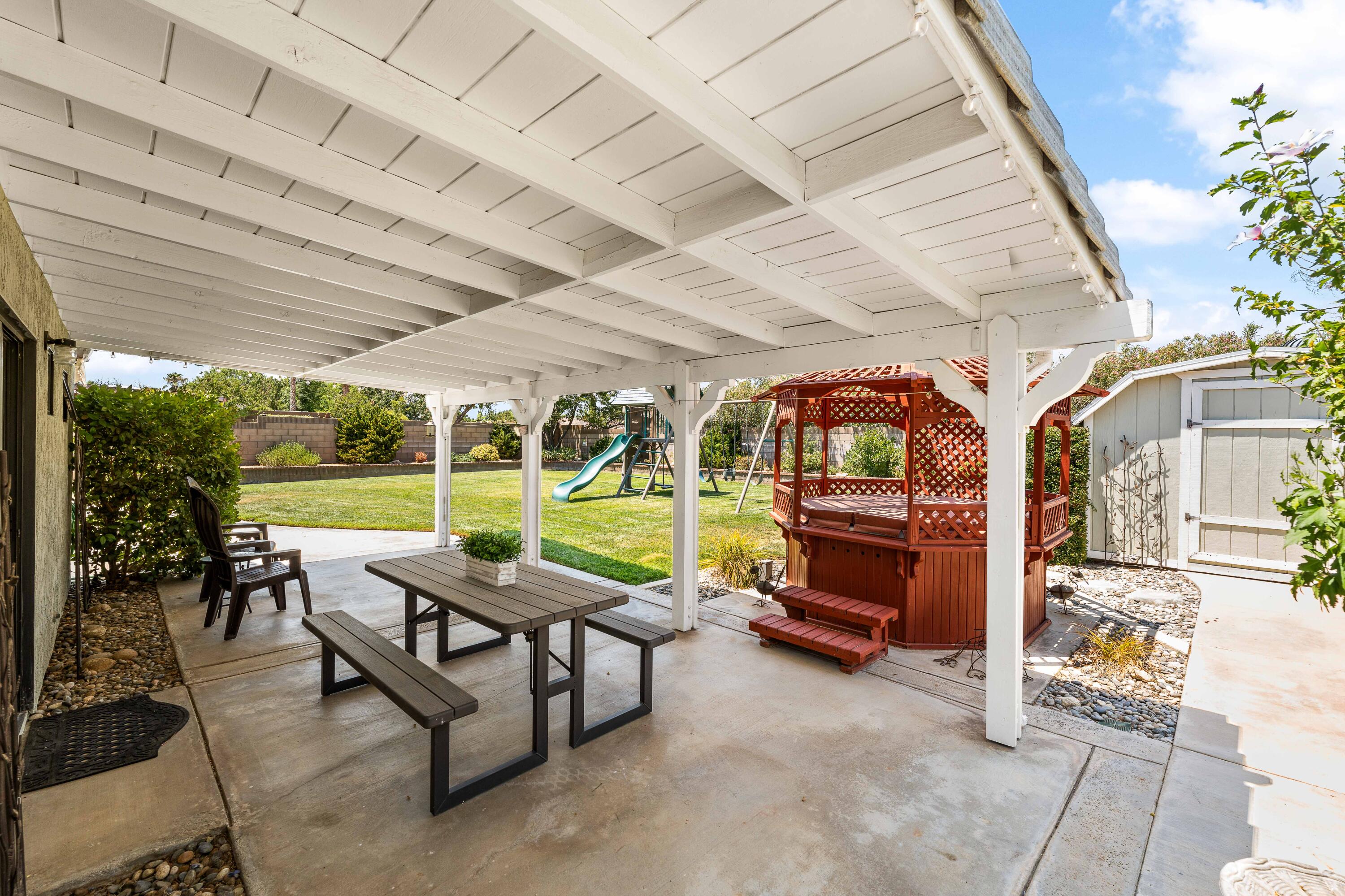 6311 West Ave L12 Lancaster, CA 93536 - Photo 47 of 55 a building outdoor space with patio lots of furniture