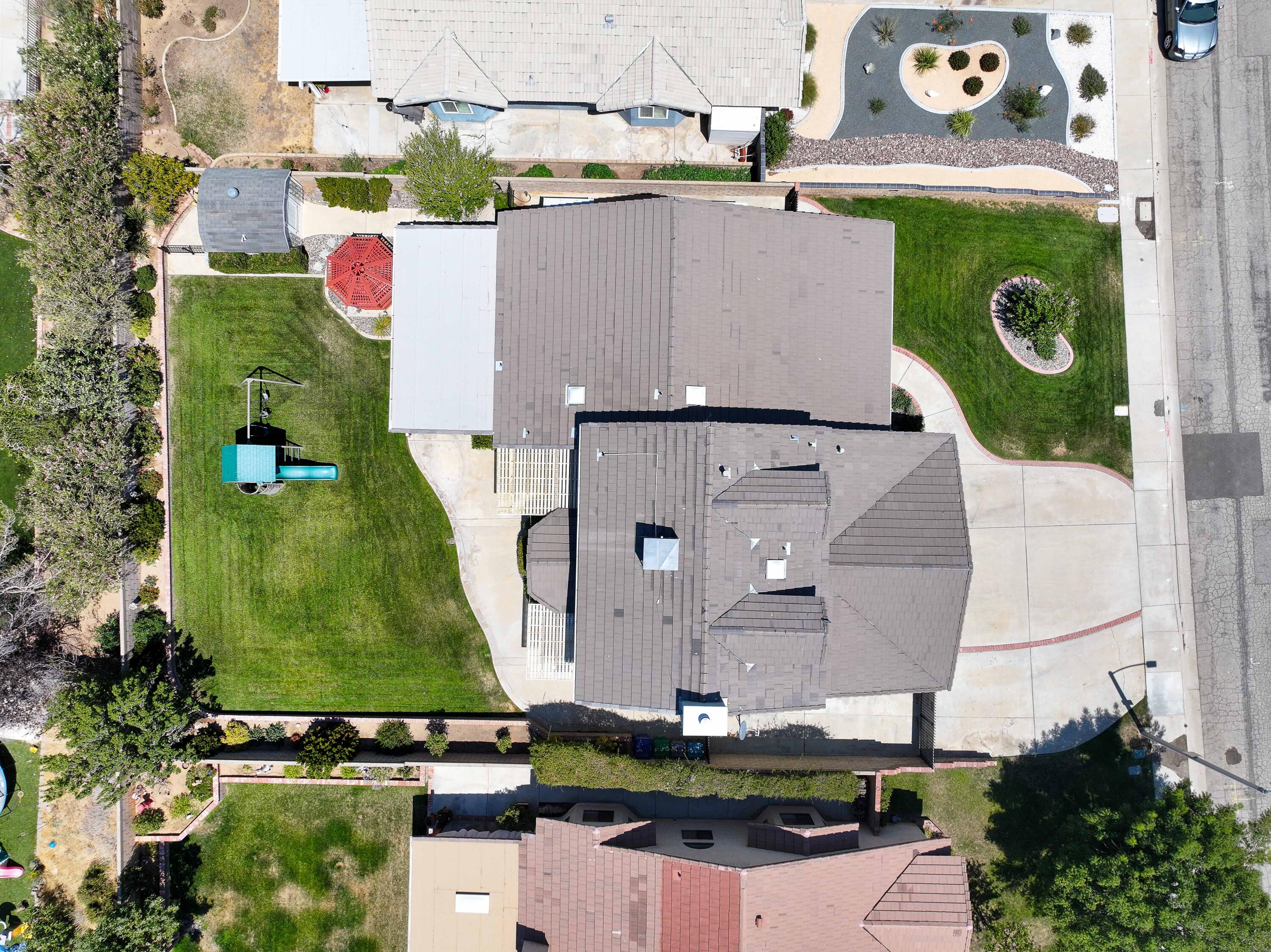 6311 West Ave L12 Lancaster, CA 93536 - Photo 54 of 55 an aerial view of residential house with outdoor space and swimming pool