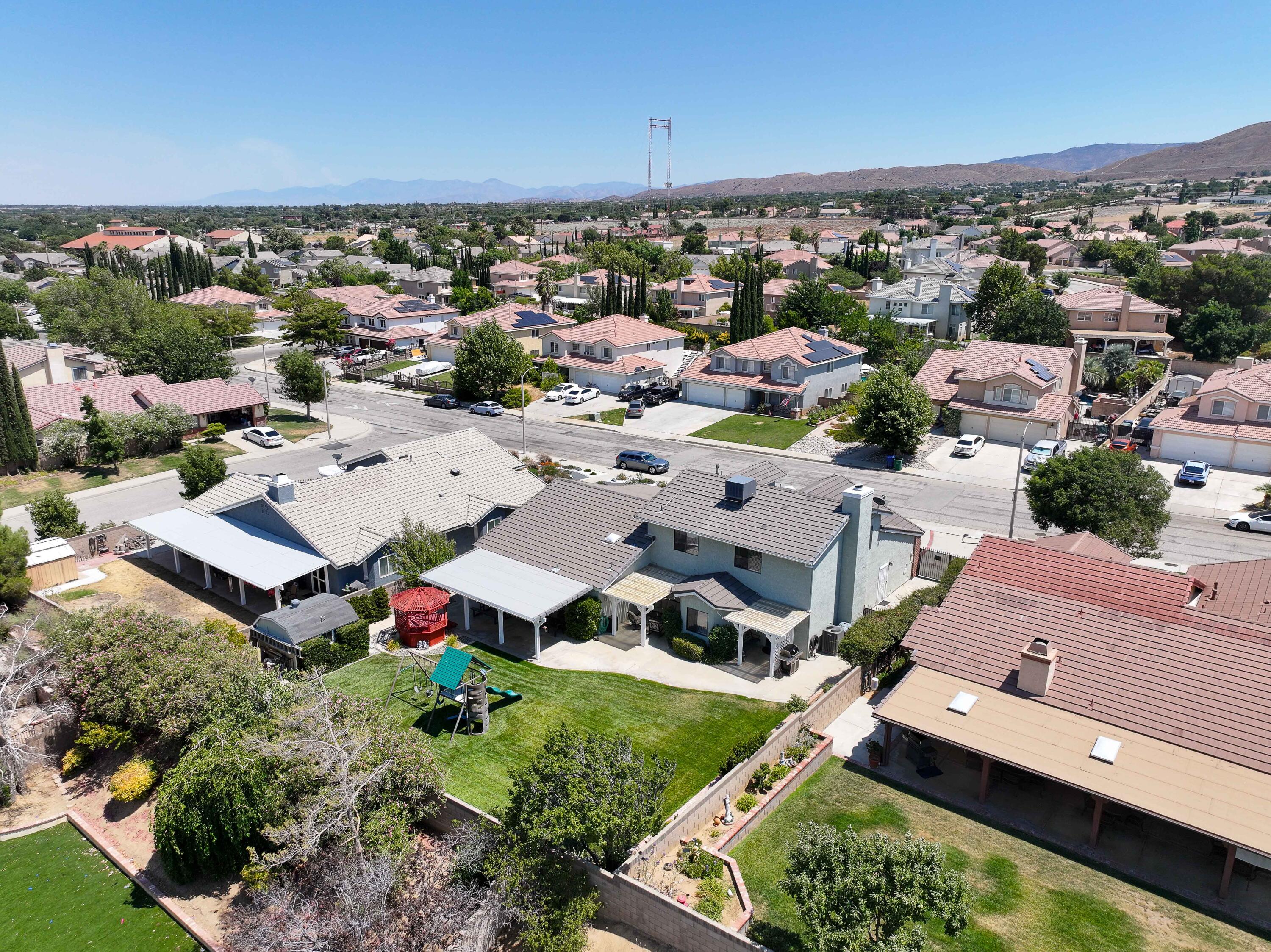 6311 West Ave L12 Lancaster, CA 93536 - Photo 55 of 55 an aerial view of residential houses with outdoor space
