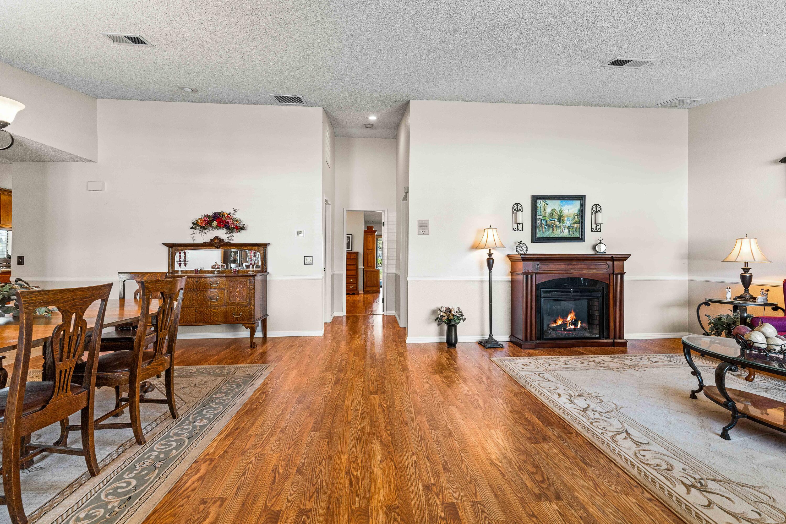 6311 West Ave L12 Lancaster, CA 93536 - Photo 6 of 55 a view of a livingroom with furniture and a fireplace