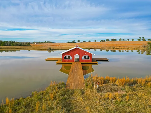 a view of park with large trees