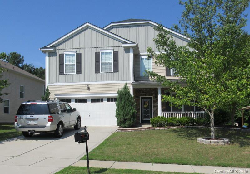 1135 Spicewood Pines Road, Unit 15 Fort Mill, SC 29708 - Photo 1 of 15 a car parked in front of a white house