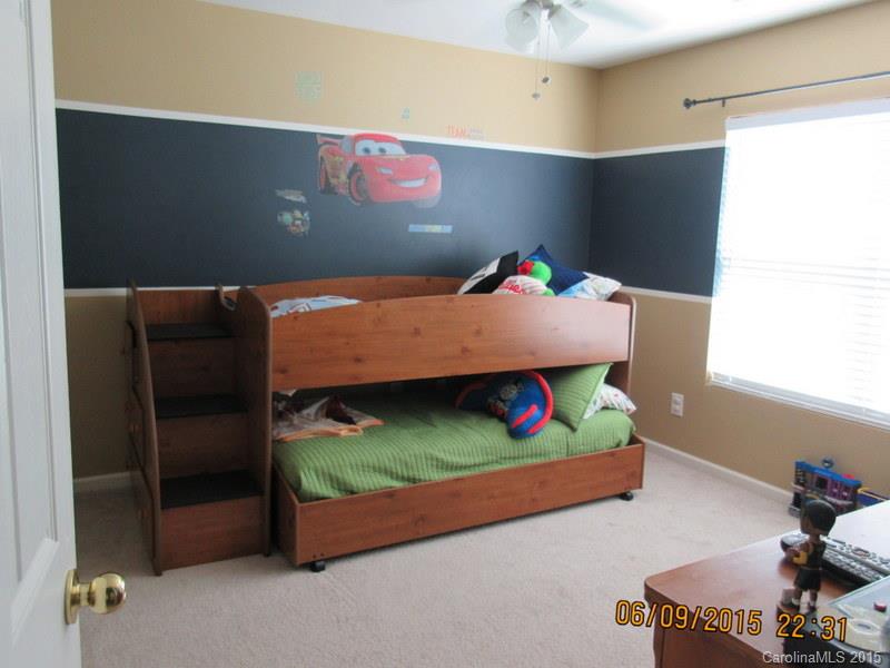 1135 Spicewood Pines Road, Unit 15 Fort Mill, SC 29708 - Photo 12 of 15 a bedroom with bed and window