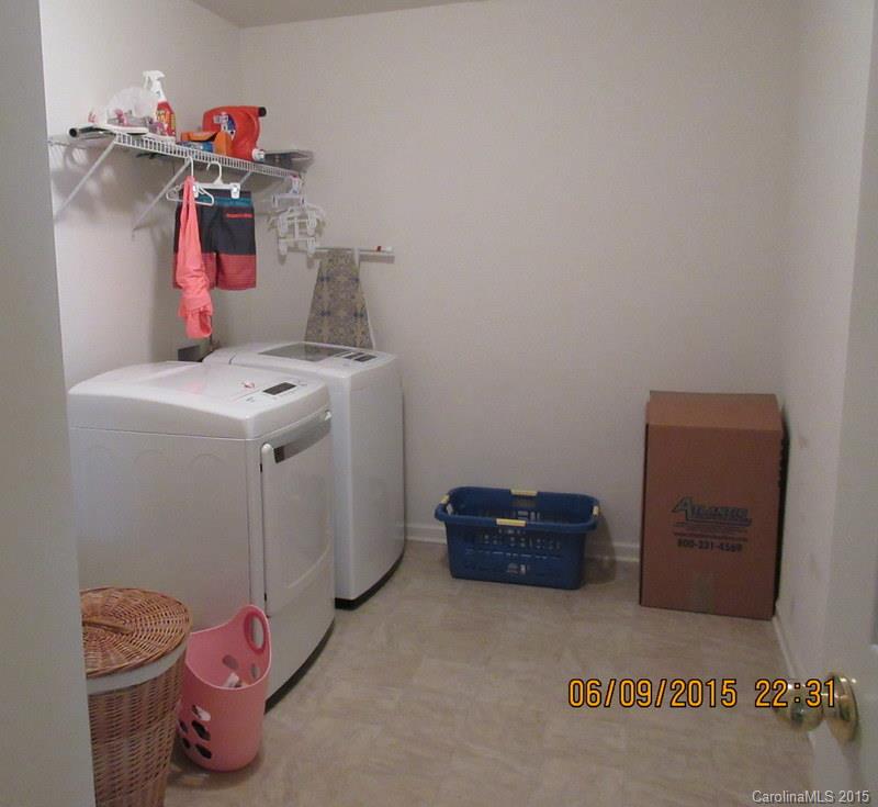 1135 Spicewood Pines Road, Unit 15 Fort Mill, SC 29708 - Photo 14 of 15 a utility room with dryer and washer
