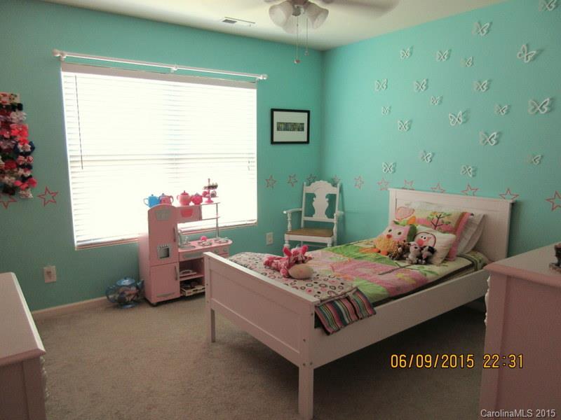 1135 Spicewood Pines Road, Unit 15 Fort Mill, SC 29708 - Photo 10 of 15 a bed room with a bed and a window