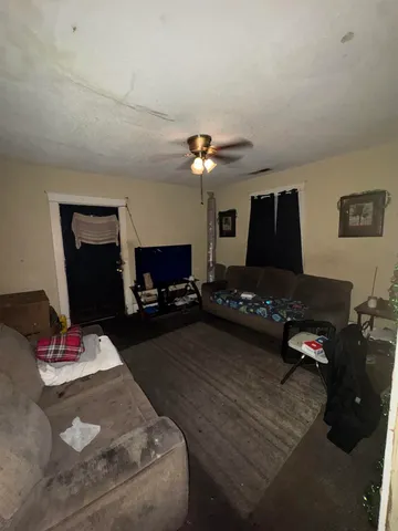 a bedroom with furniture and a fireplace