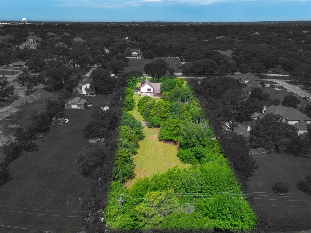 7404 John McCain Road Colleyville, TX 76034 - Photo 8 of 21 Aerial overview highlighting a generously sized property with extensive green space