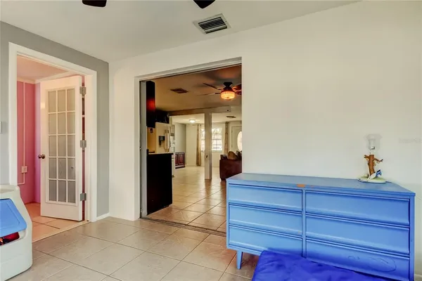 a view of room with furniture and a window