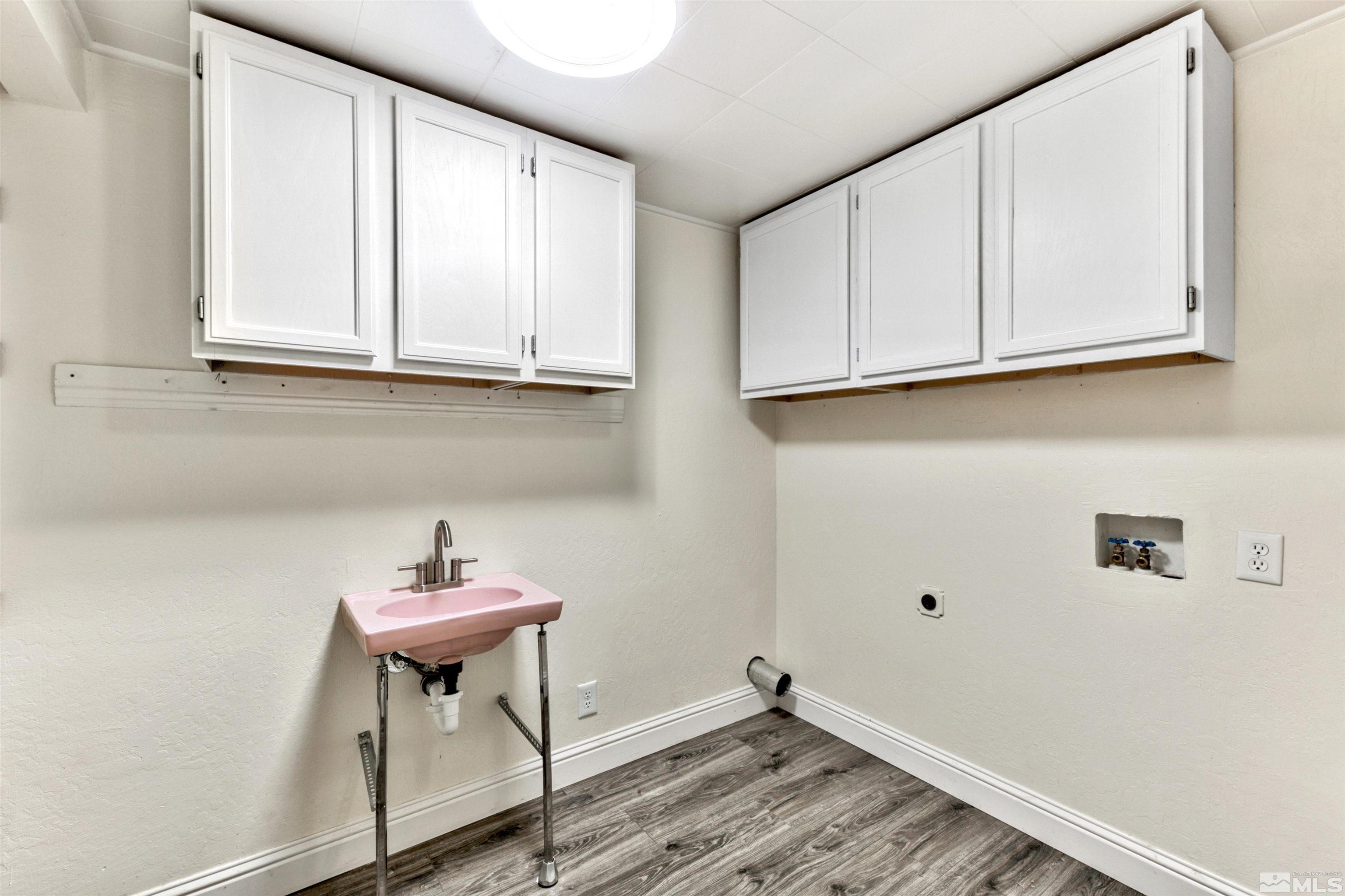 3900 Ormsby Place Washoe Valley, NV 89704 - Photo 12 of 18 a view of a room with wooden floor and cabinets