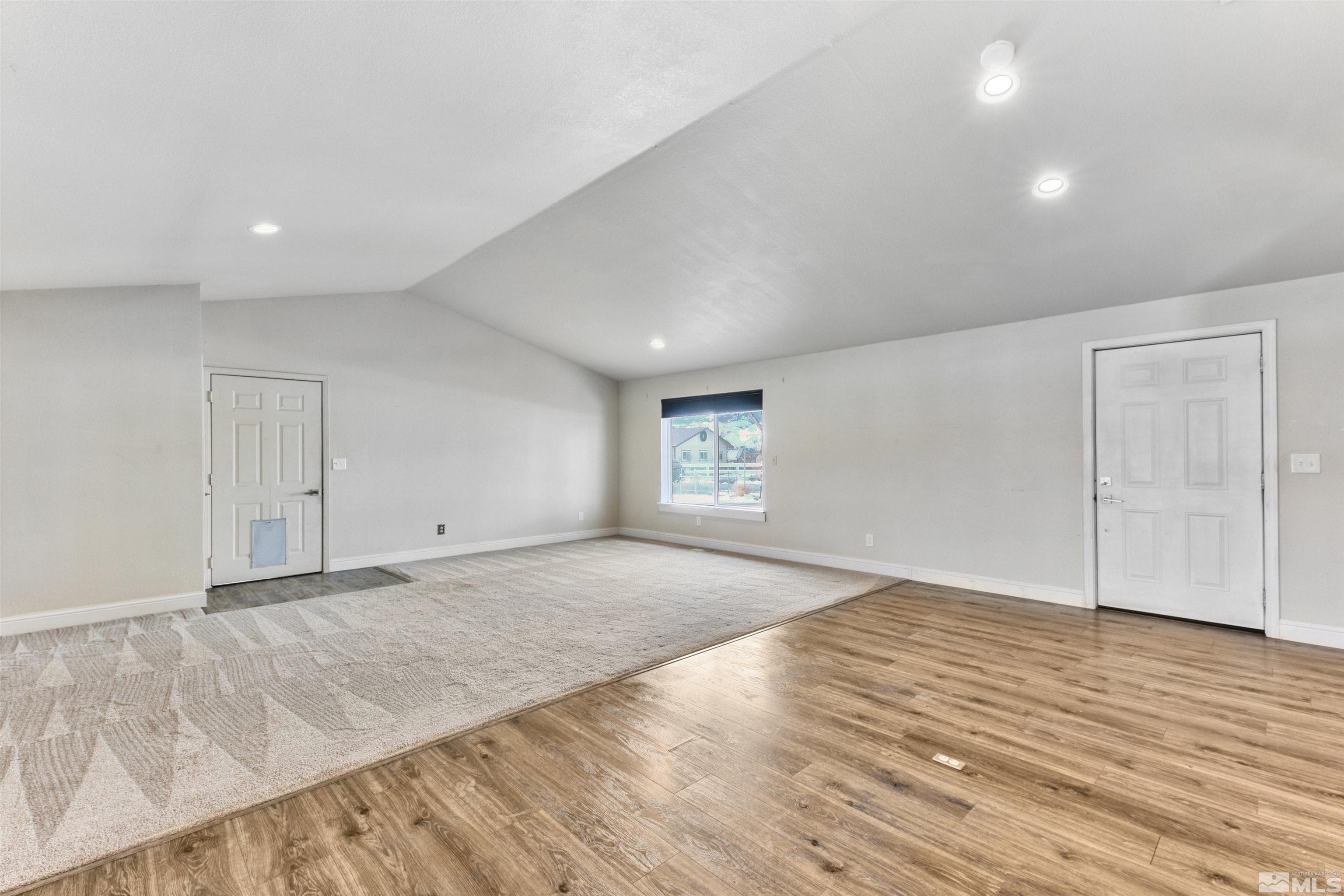 3900 Ormsby Place Washoe Valley, NV 89704 - Photo 4 of 18 a view of empty room with wooden floor