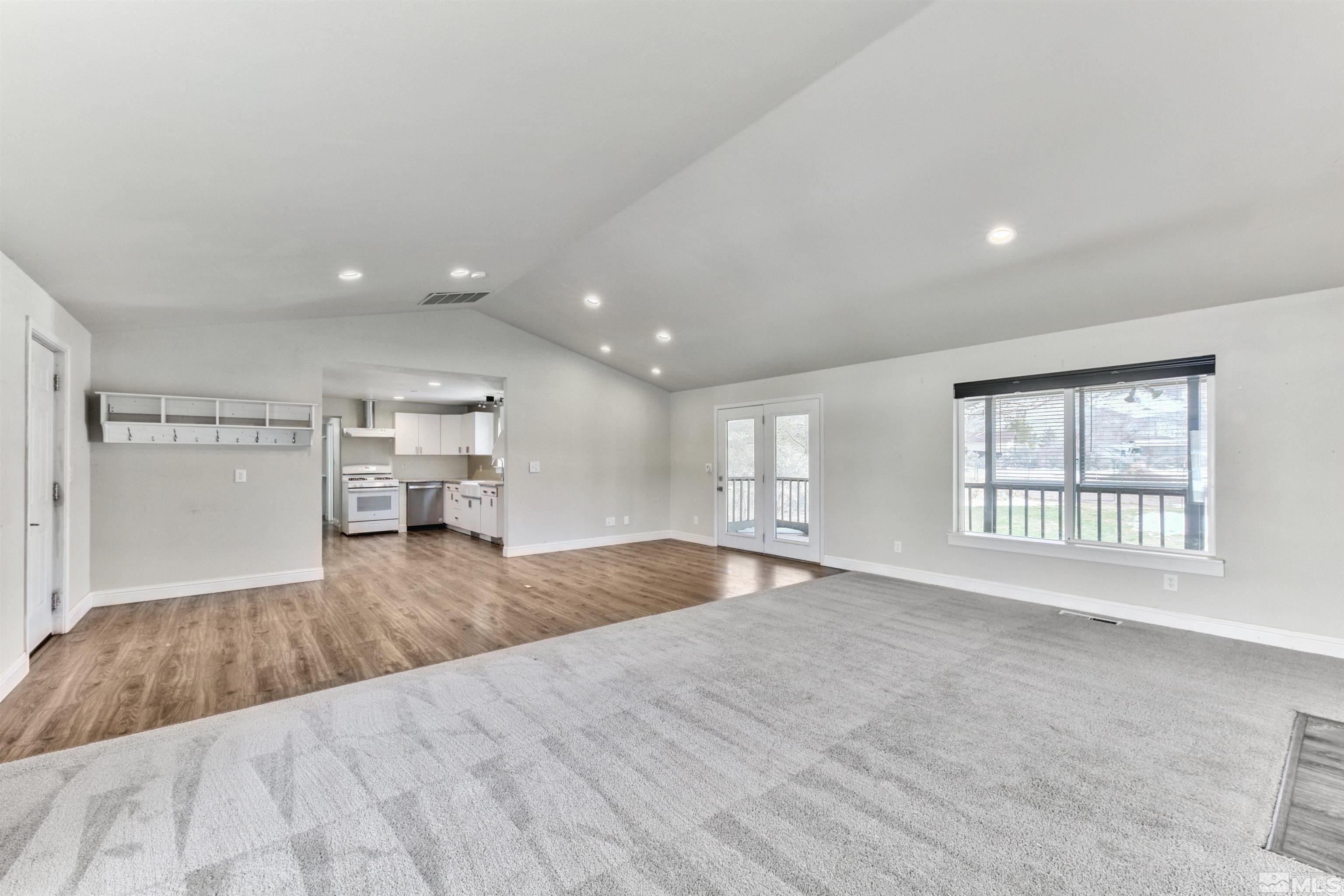3900 Ormsby Place Washoe Valley, NV 89704 - Photo 5 of 18 a view of empty room with wooden floor and window