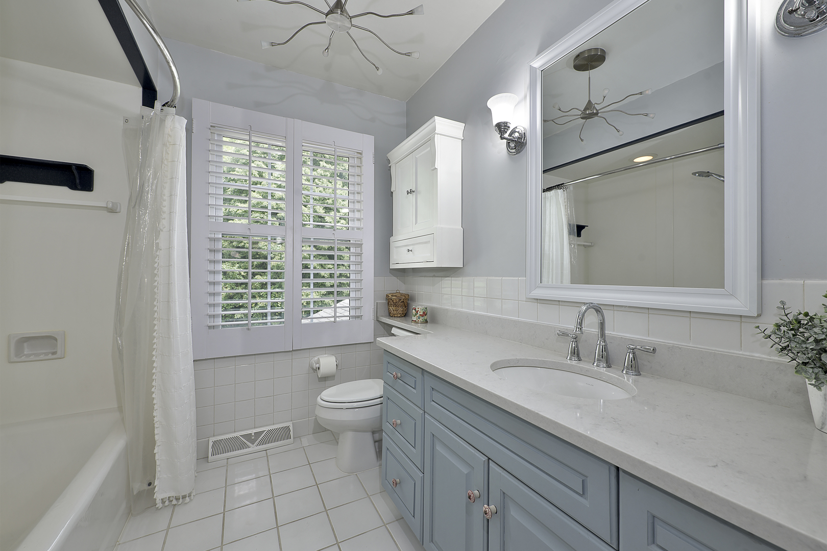 1550 Banbury Road Inverness, IL 60067 - Photo 14 of 32 a bathroom with a granite countertop sink toilet and shower