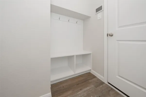 a view of an empty walk in closet