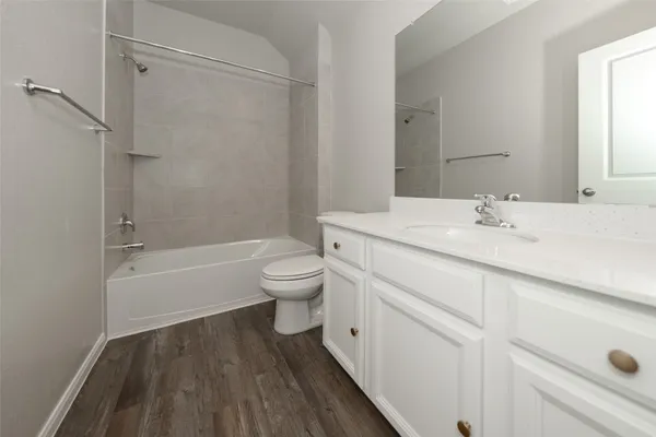 a white bath tub sitting in a bathroom