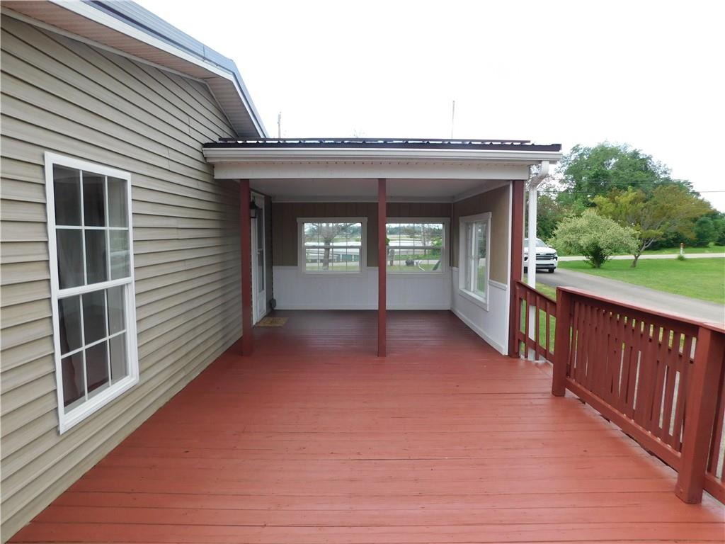 140 Firestone Road Smithfield, PA 15478 - Photo 9 of 33 a view of outdoor space and deck