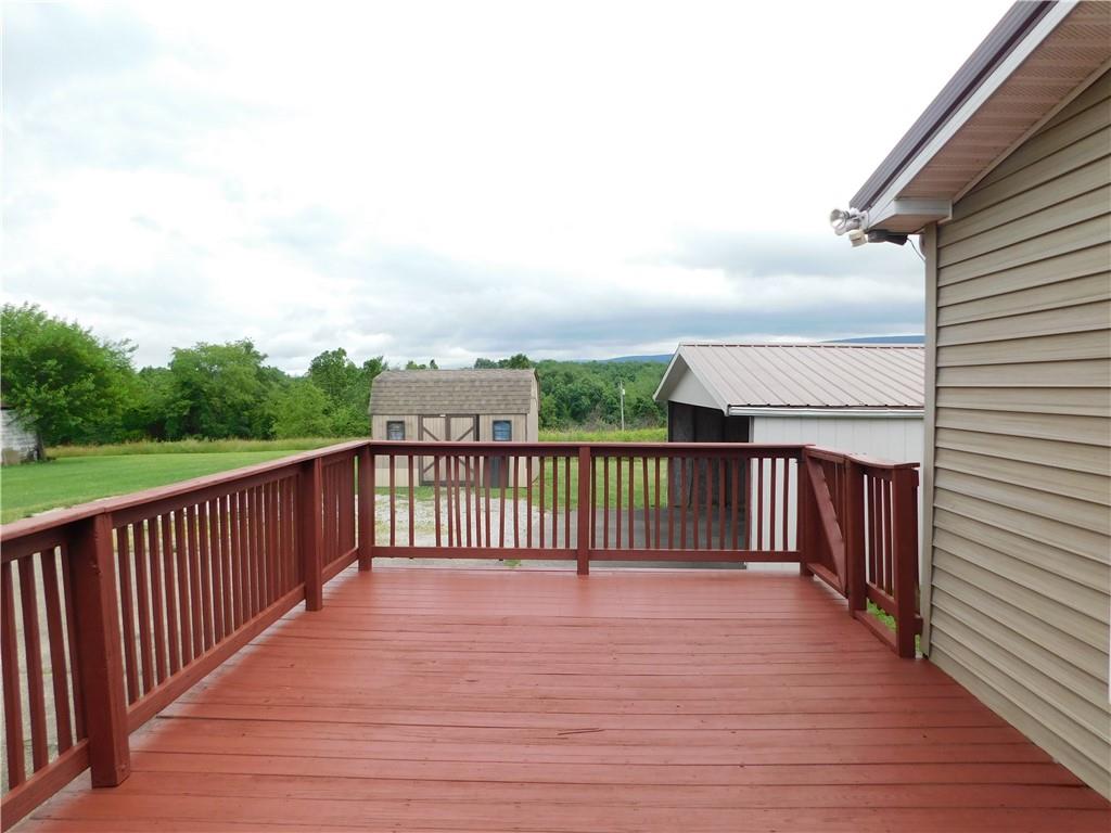 140 Firestone Road Smithfield, PA 15478 - Photo 10 of 33 a view of a balcony with wooden floor