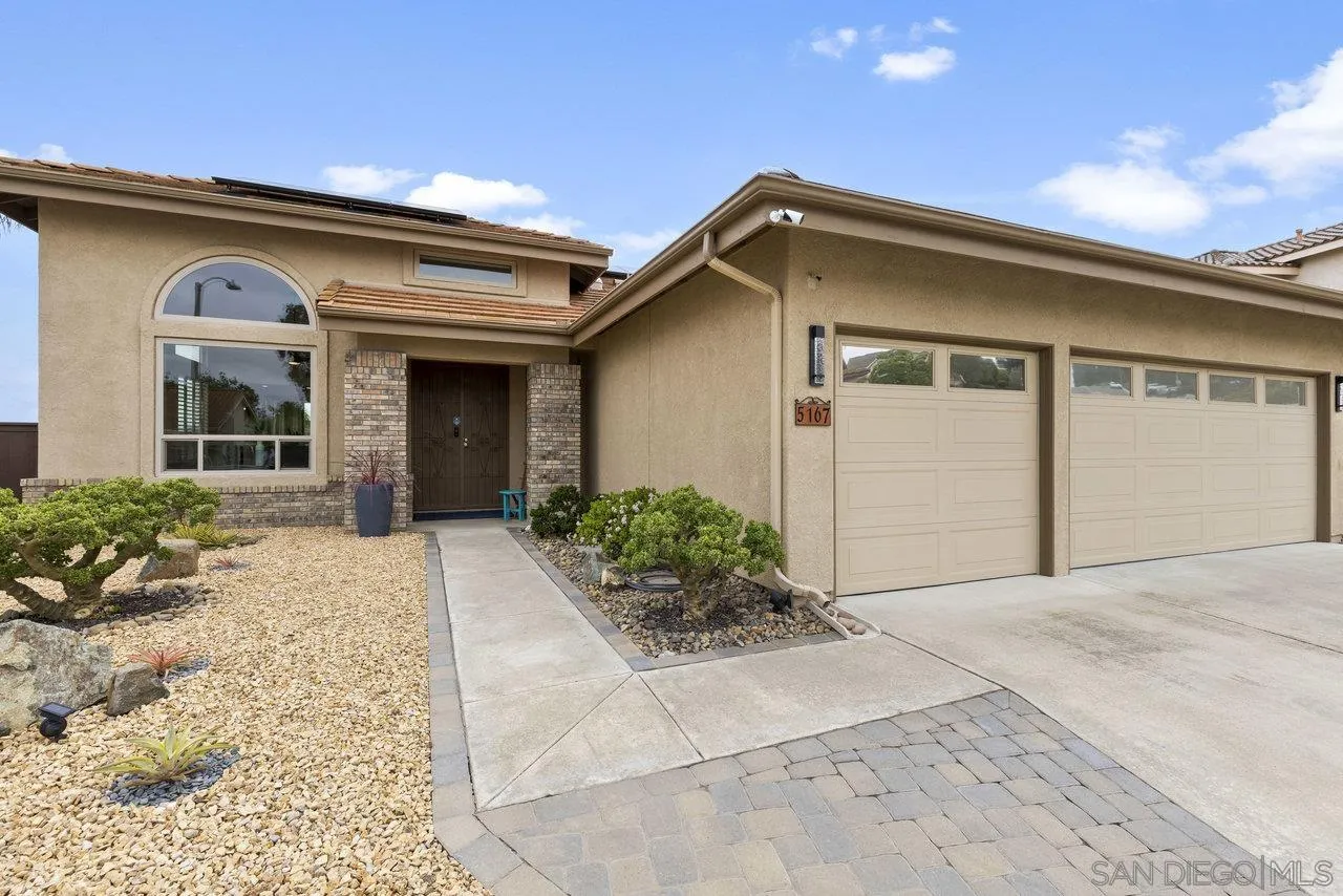 5167 Avenida De La Plata Oceanside, CA 92057 - Photo 2 of 53 a view of a house with a yard