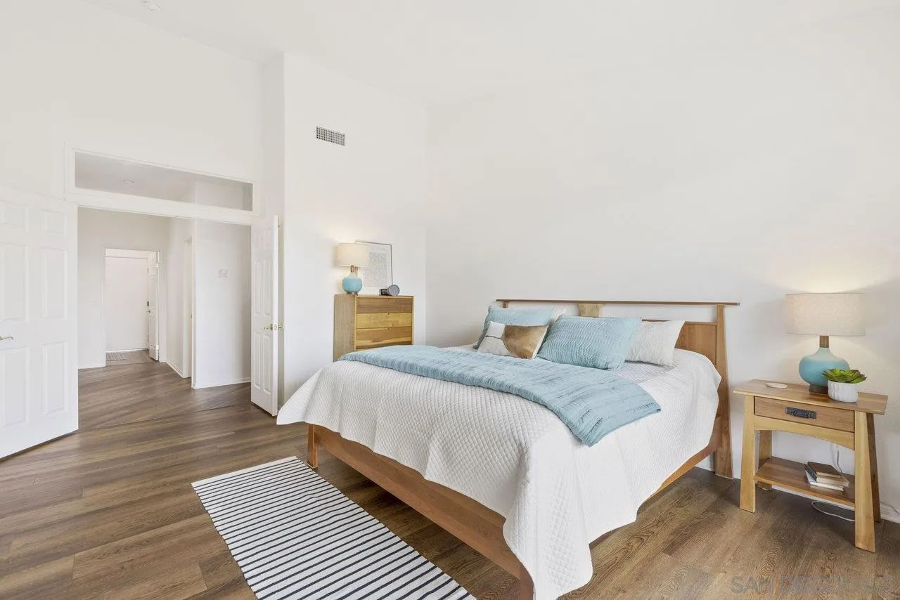 5167 Avenida De La Plata Oceanside, CA 92057 - Photo 22 of 53 a spacious bedroom with a bed and dresser