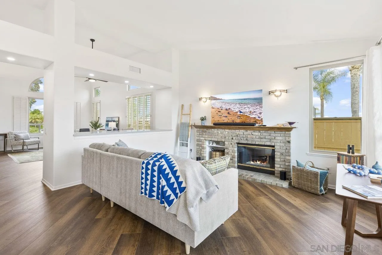 5167 Avenida De La Plata Oceanside, CA 92057 - Photo 32 of 53 a living room with furniture and a fireplace