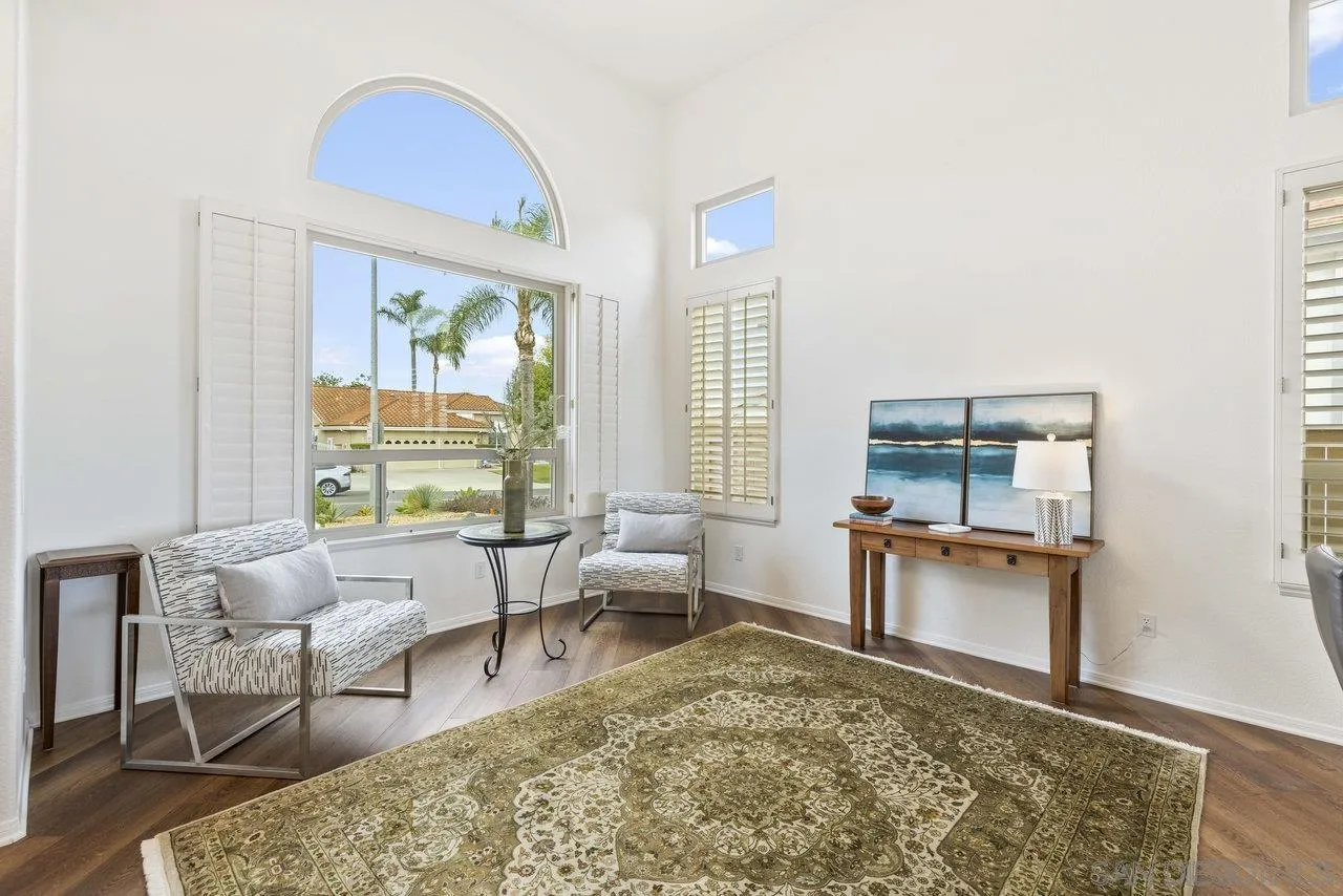 5167 Avenida De La Plata Oceanside, CA 92057 - Photo 35 of 53 a living room with furniture and a large window