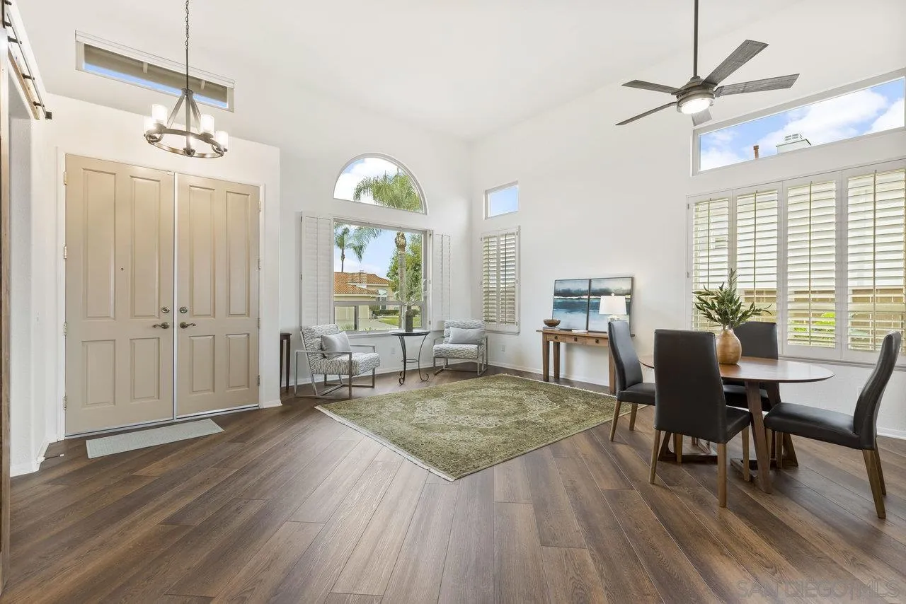 5167 Avenida De La Plata Oceanside, CA 92057 - Photo 36 of 53 a living room with furniture and a wooden floor