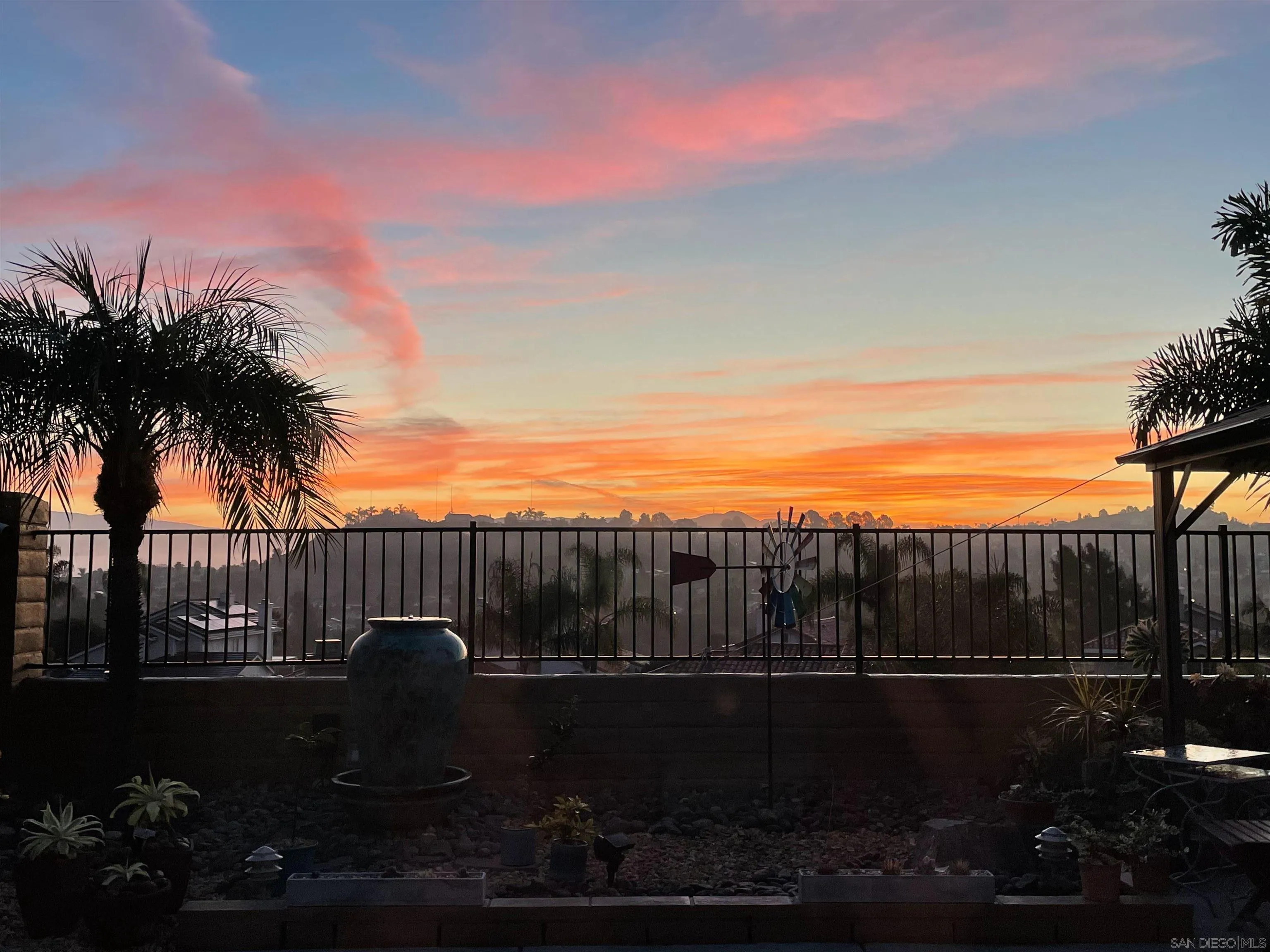 5167 Avenida De La Plata Oceanside, CA 92057 - Photo 42 of 53 a backyard of a house with table and chairs