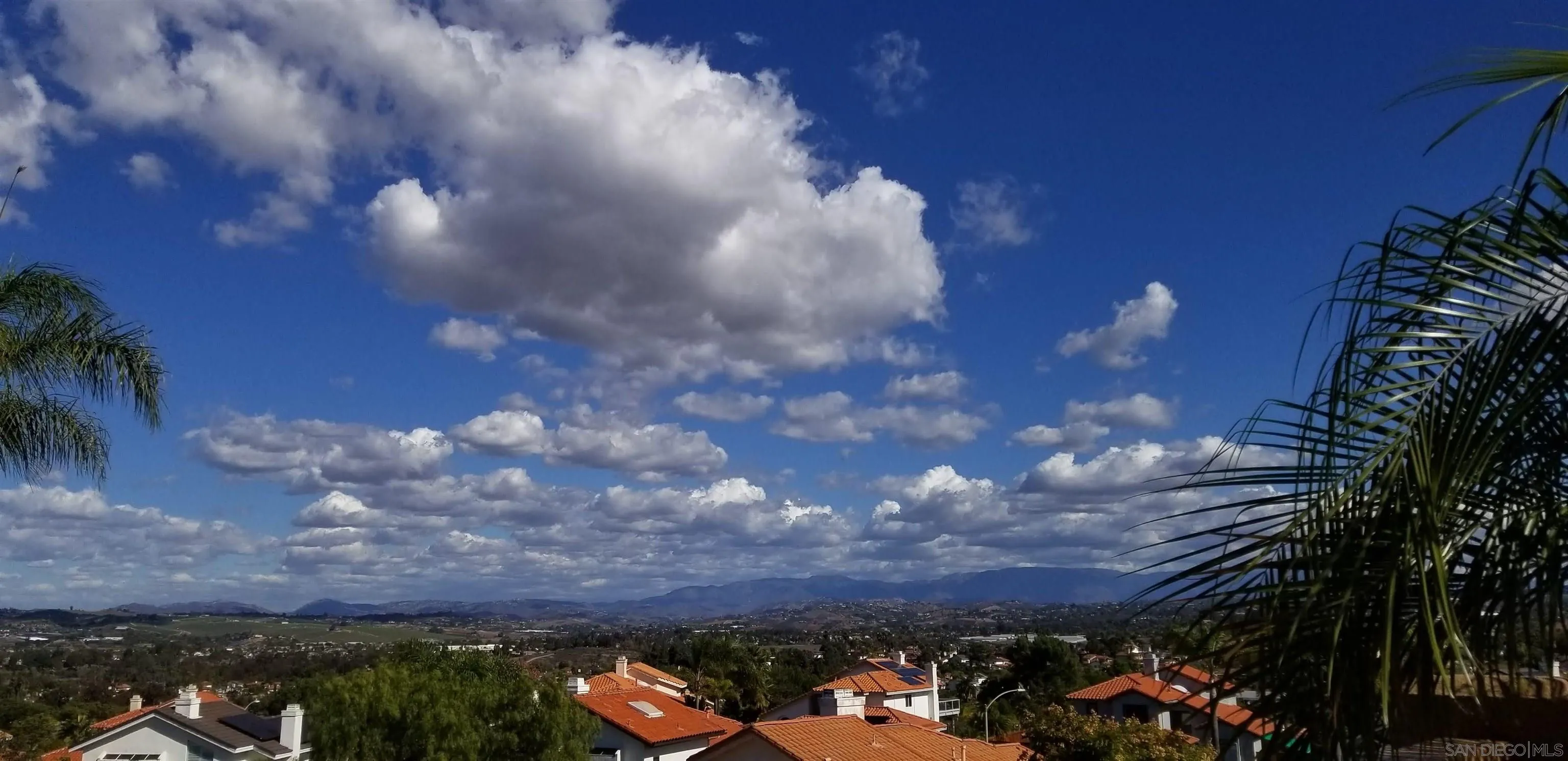 5167 Avenida De La Plata Oceanside, CA 92057 - Photo 43 of 53 a view of a building in the background