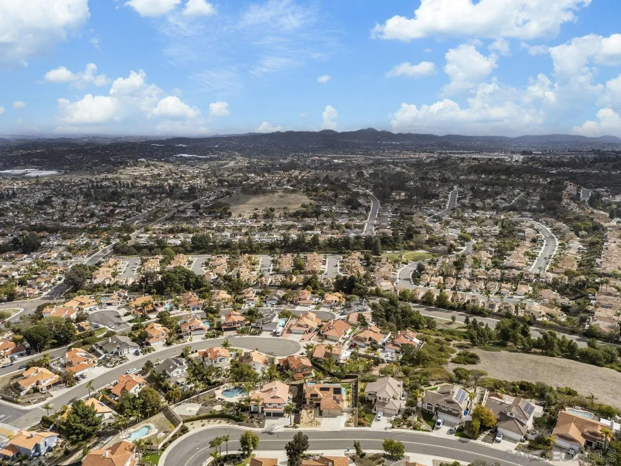 5167 Avenida De La Plata Oceanside, CA 92057 - Photo 46 of 53 an aerial view of residential building with green space
