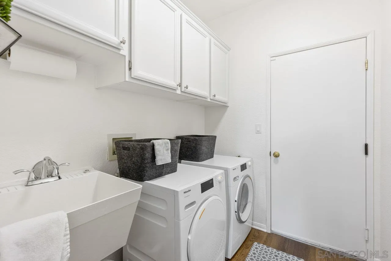 5167 Avenida De La Plata Oceanside, CA 92057 - Photo 48 of 53 a utility room with dryer and washer