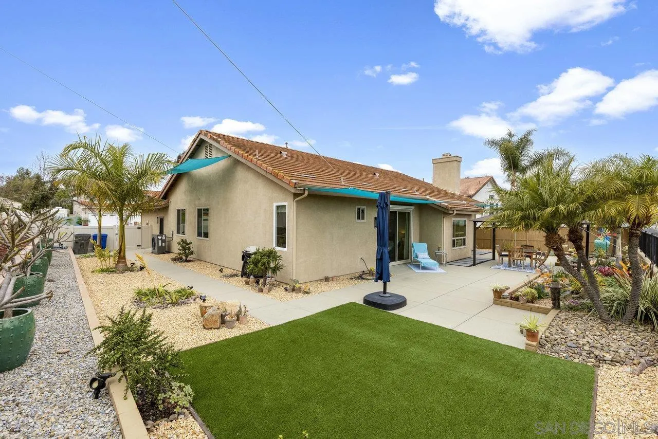 5167 Avenida De La Plata Oceanside, CA 92057 - Photo 10 of 53 a view of a backyard with a sitting area