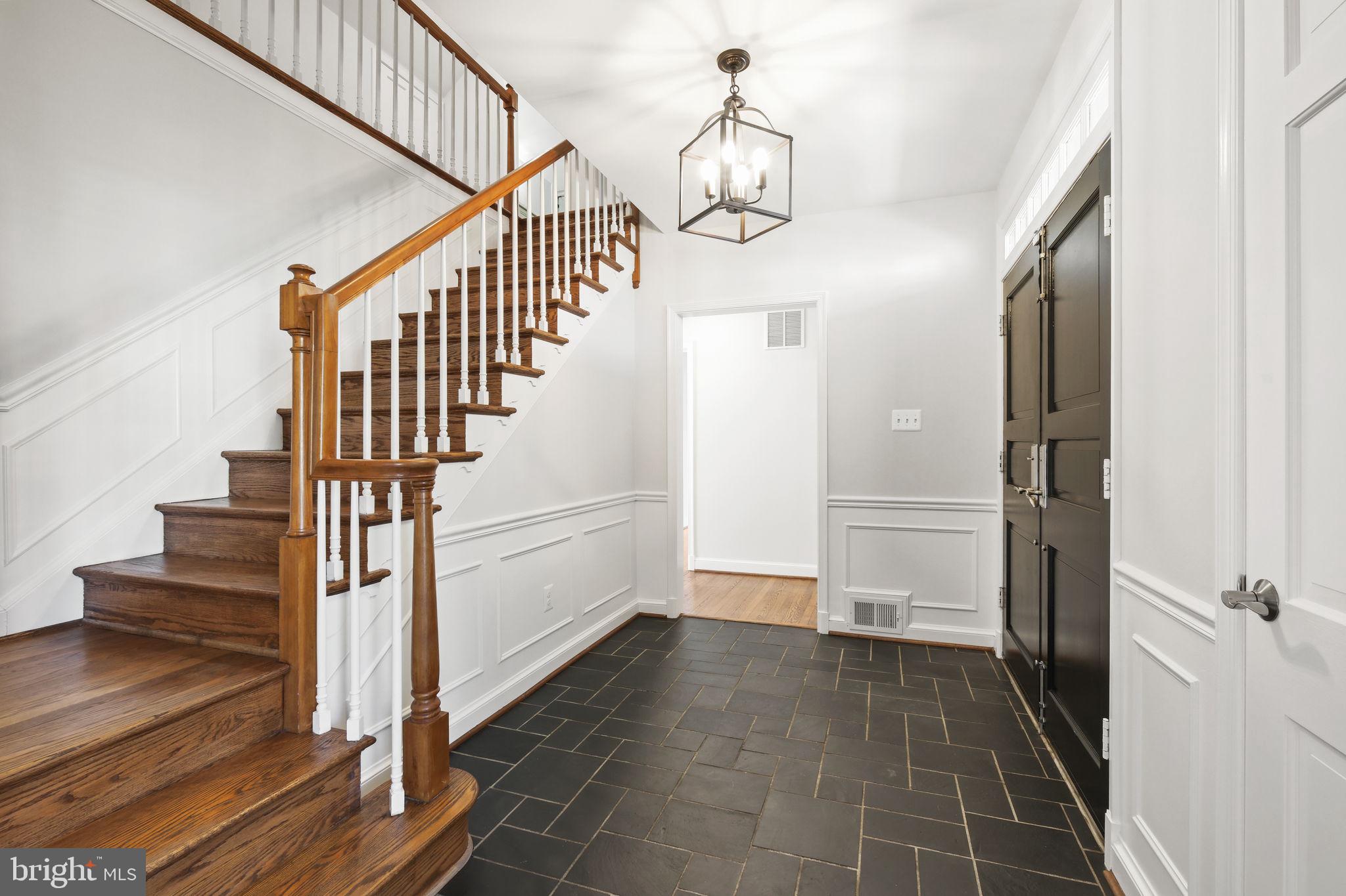 11005 Luxmanor Road North Bethesda, MD 20852 - Photo 11 of 49 a view of entryway and hall with wooden floor