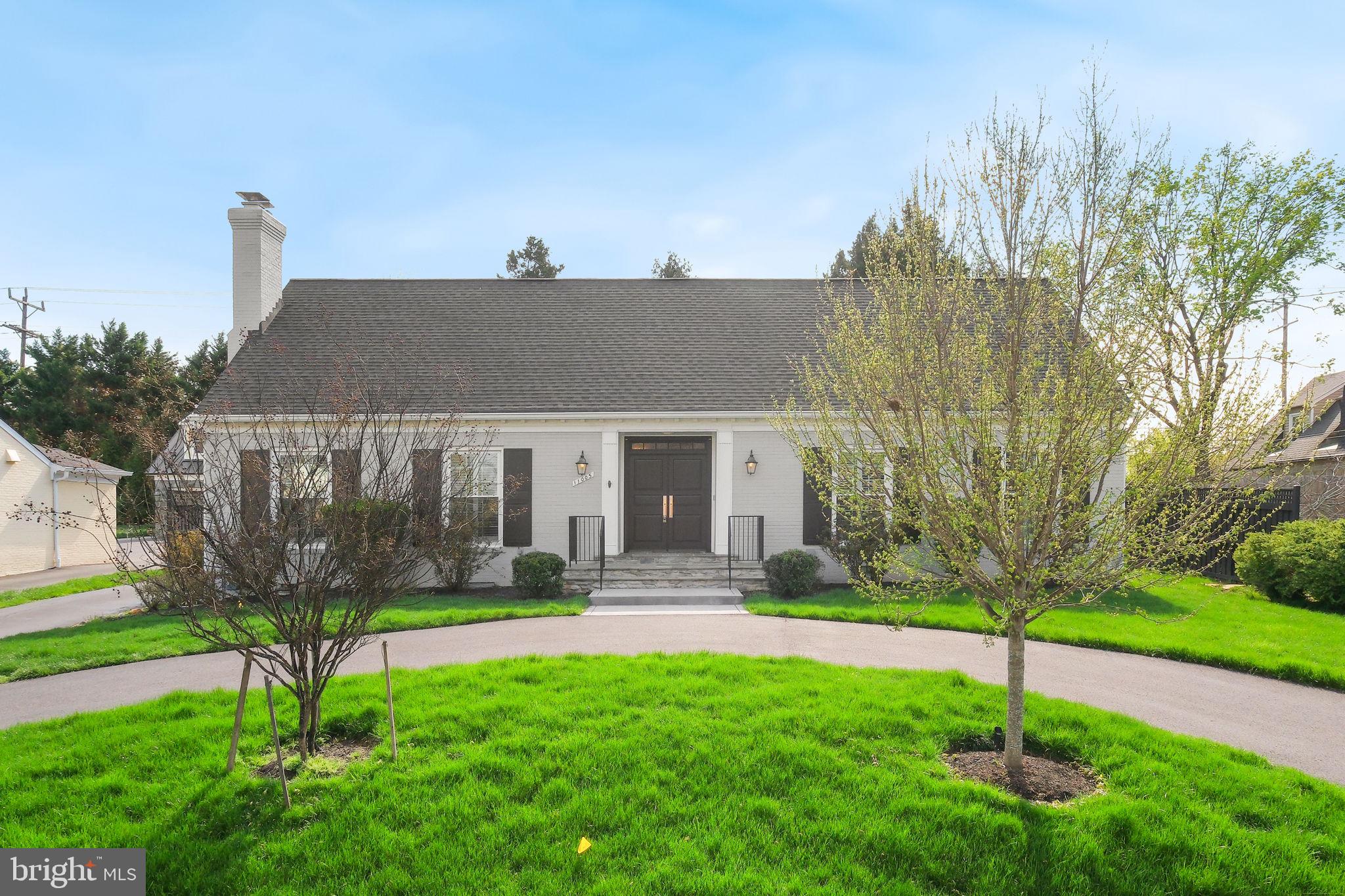 11005 Luxmanor Road North Bethesda, MD 20852 - Photo 2 of 49 a front view of a house with garden
