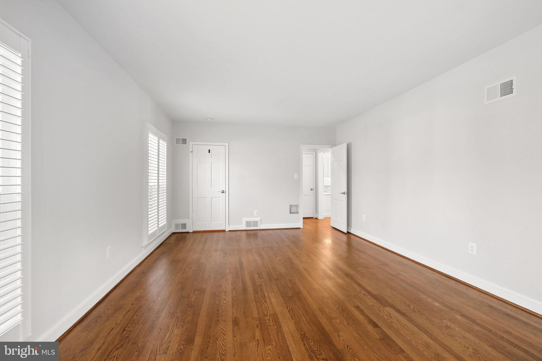 11005 Luxmanor Road North Bethesda, MD 20852 - Photo 21 of 49 an empty room with wooden floor