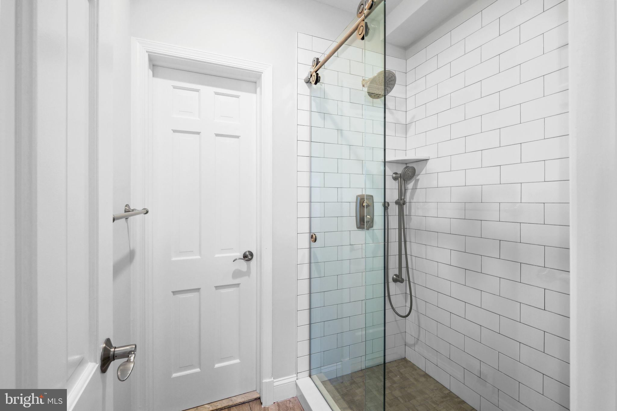 11005 Luxmanor Road North Bethesda, MD 20852 - Photo 23 of 49 a bathroom with a shower