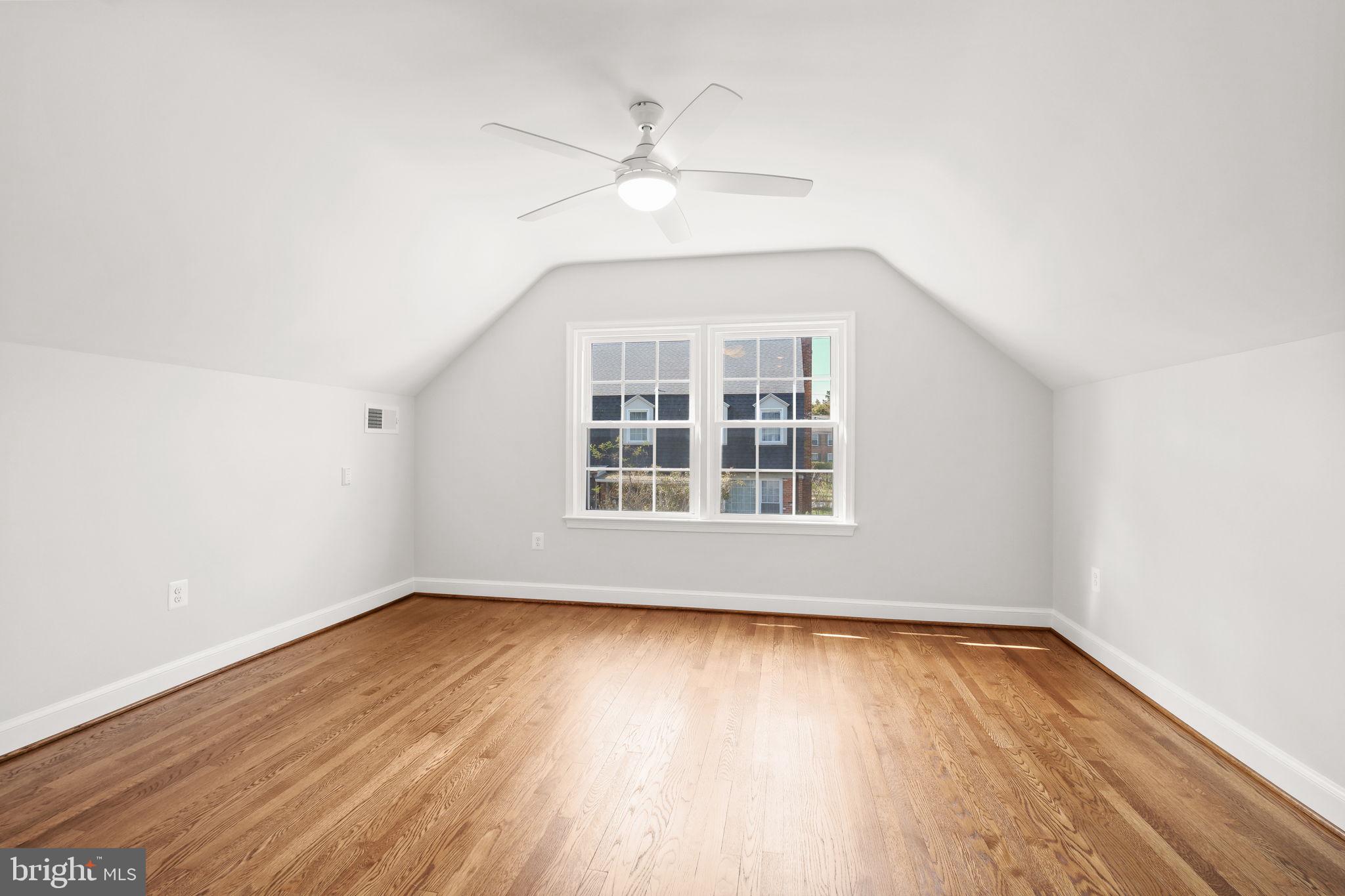 11005 Luxmanor Road North Bethesda, MD 20852 - Photo 27 of 49 wooden floor in an empty room with a window