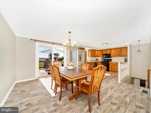 a kitchen with stainless steel appliances a refrigerator stove and sink