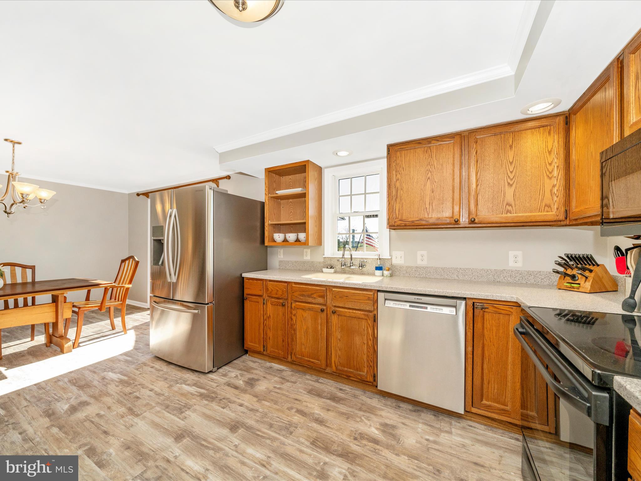 2684 Lydia Court Adamstown, MD 21710 - Photo 16 of 44 a kitchen with stainless steel appliances a refrigerator stove and sink