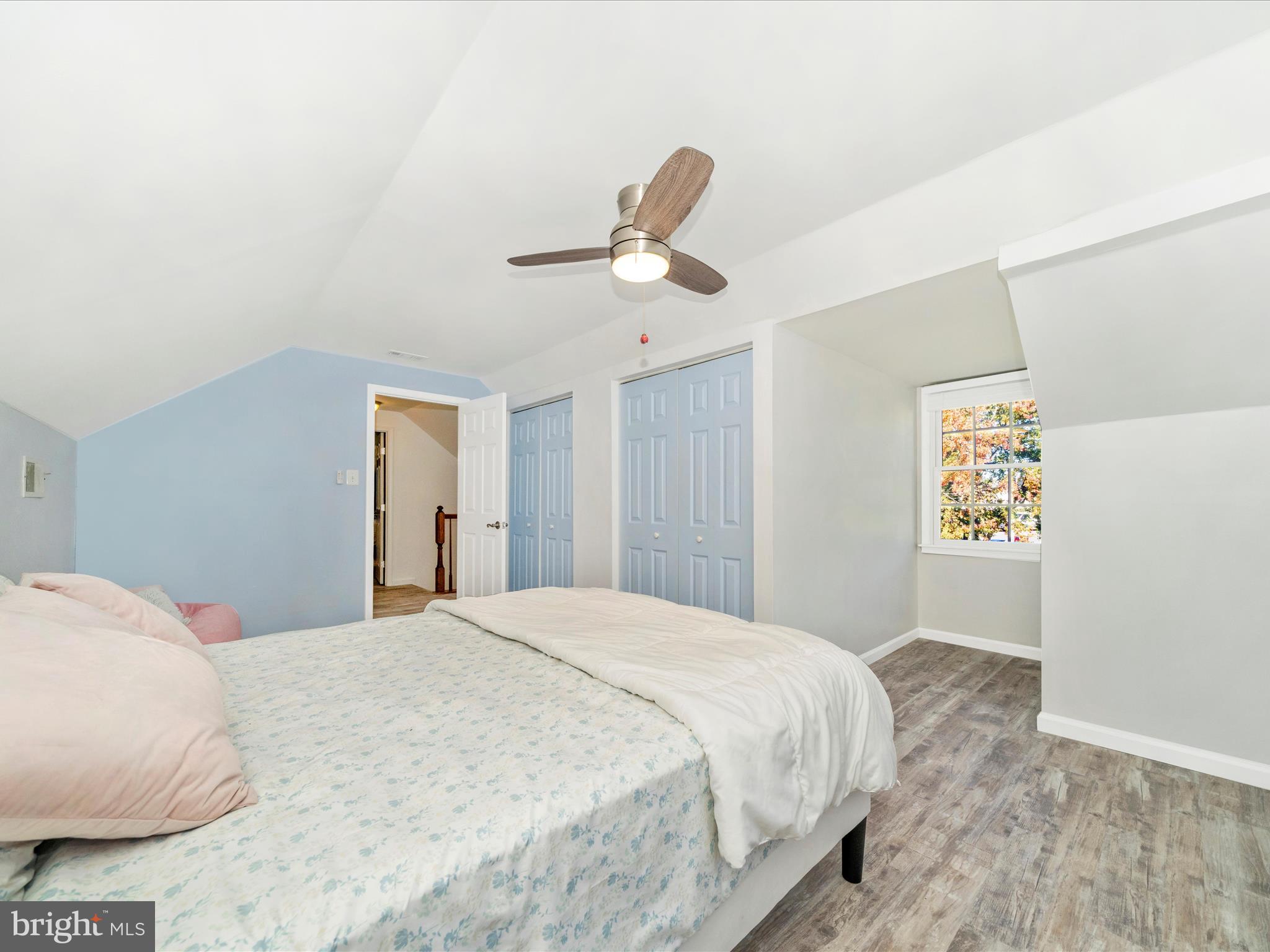 2684 Lydia Court Adamstown, MD 21710 - Photo 31 of 44 a bedroom with a bed and a chandelier