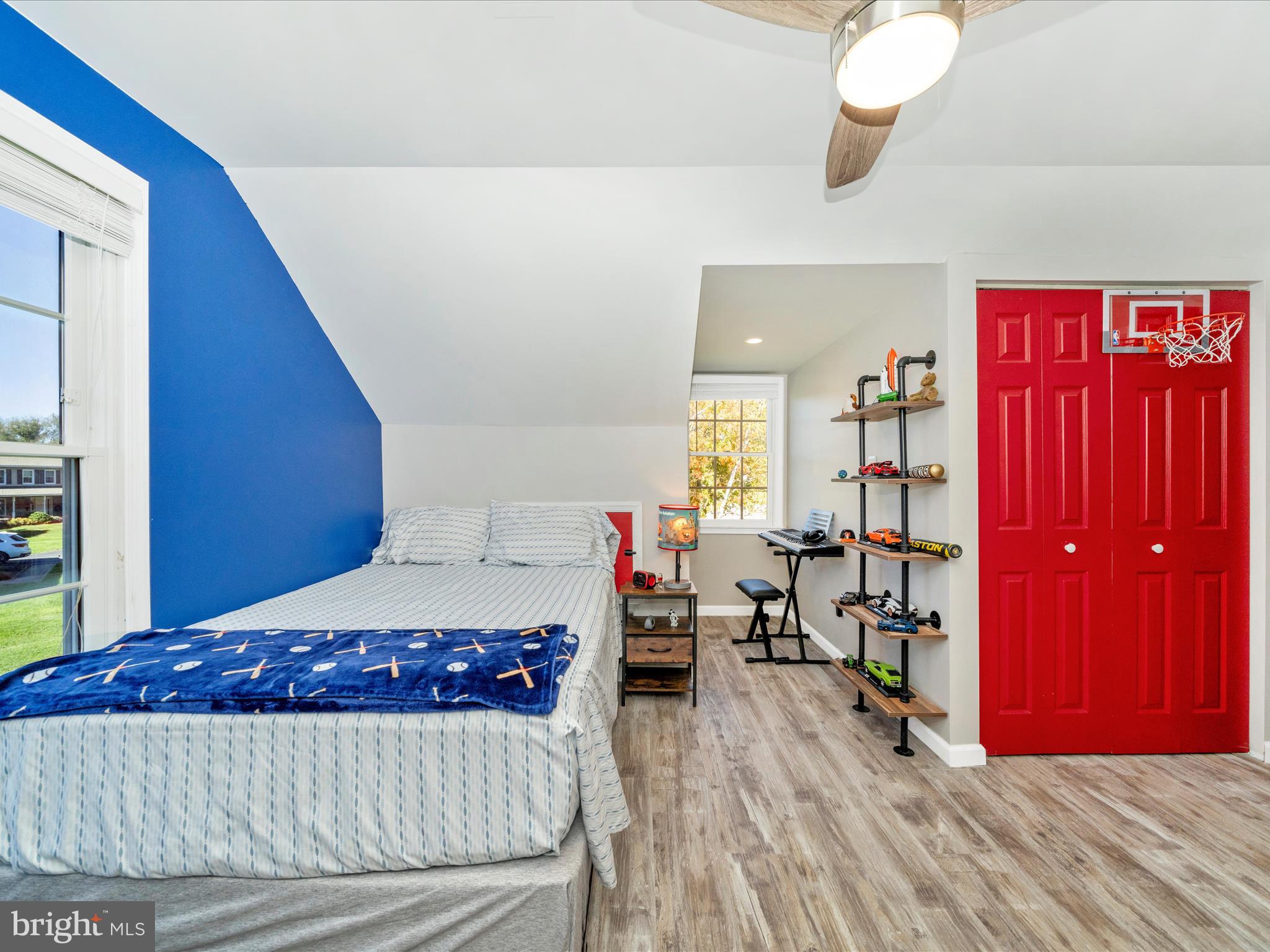 2684 Lydia Court Adamstown, MD 21710 - Photo 34 of 44 a bedroom with a large bed and a chandelier