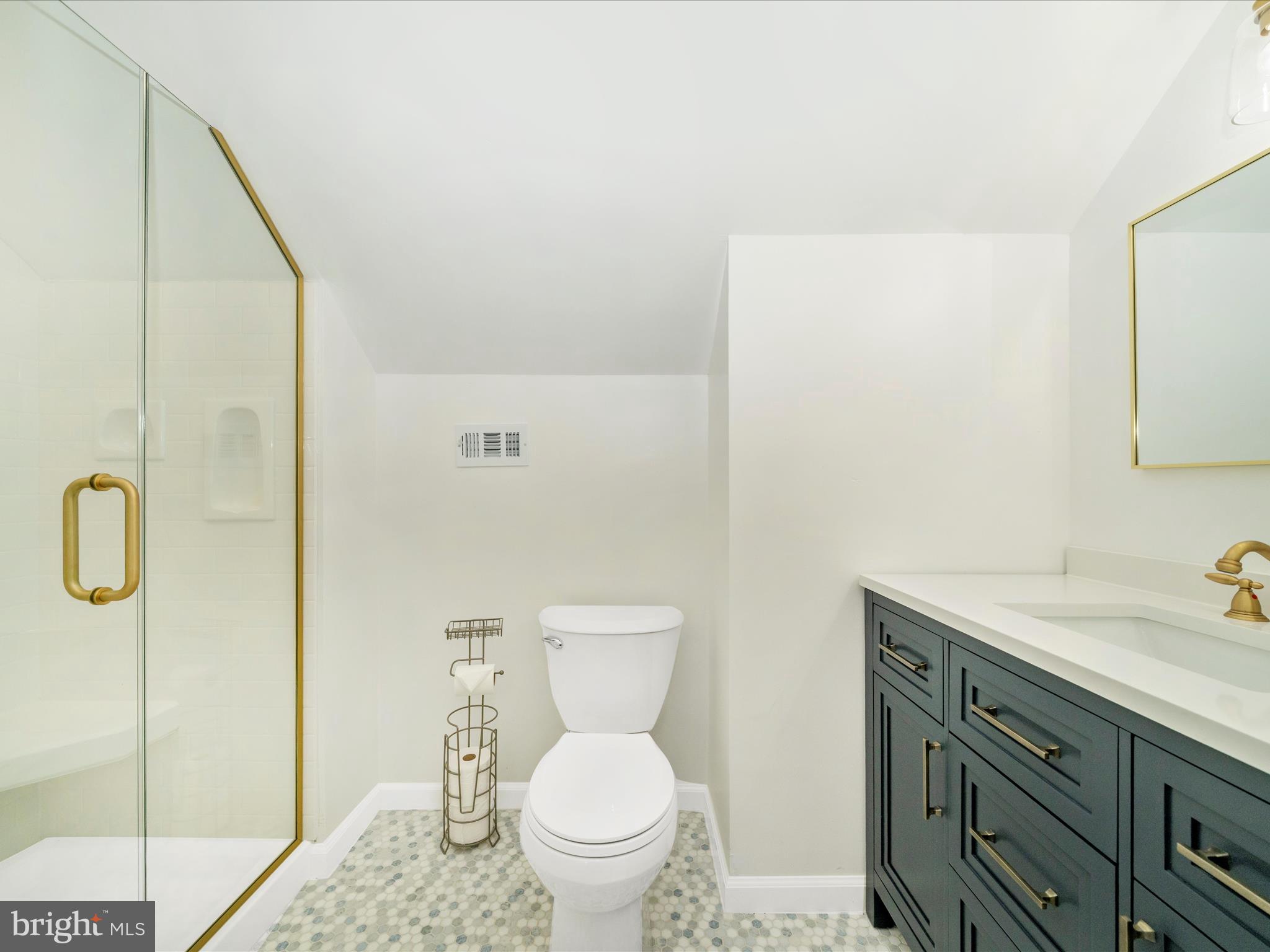 2684 Lydia Court Adamstown, MD 21710 - Photo 35 of 44 a bathroom with a granite countertop sink toilet and shower