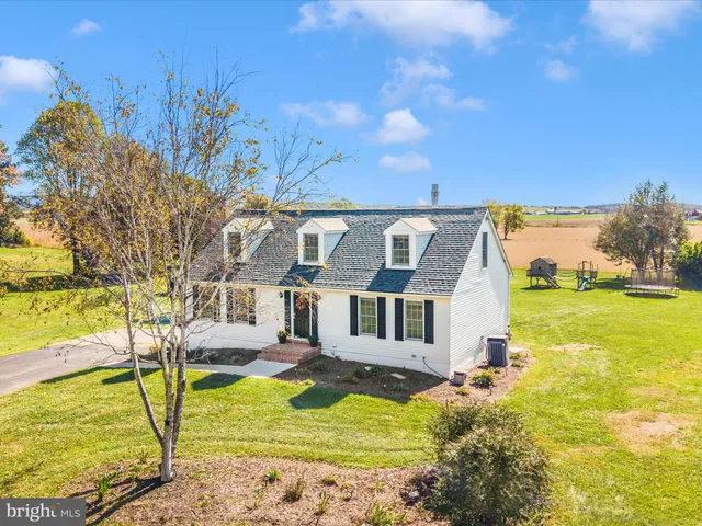 a view of a city with an ocean view