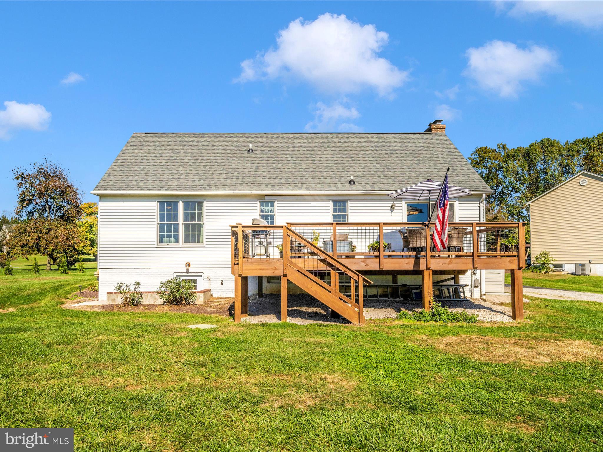 2684 Lydia Court Adamstown, MD 21710 - Photo 5 of 44 a view of a house with a backyard