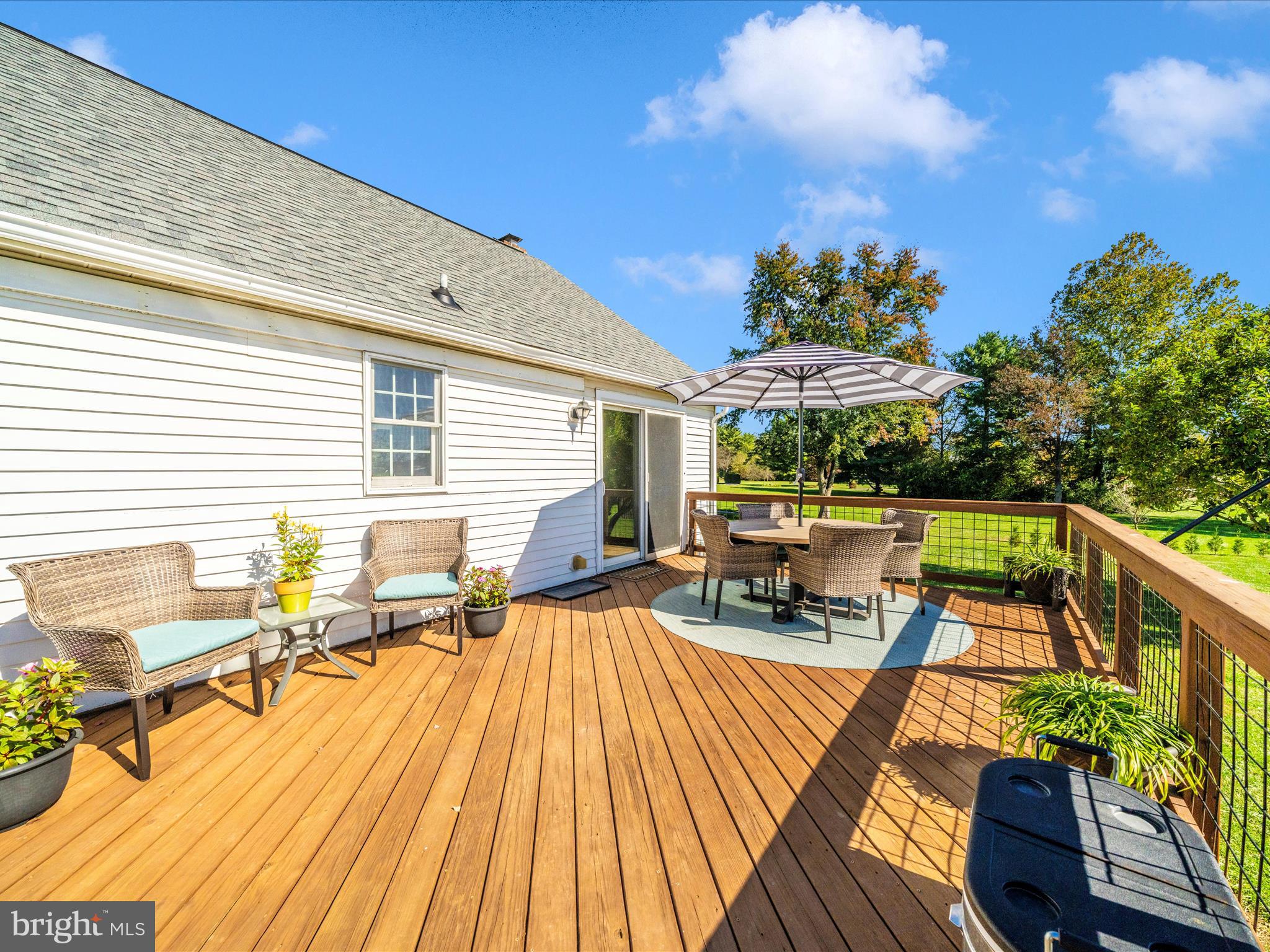 2684 Lydia Court Adamstown, MD 21710 - Photo 6 of 44 a view of a balcony with chairs and wooden floor