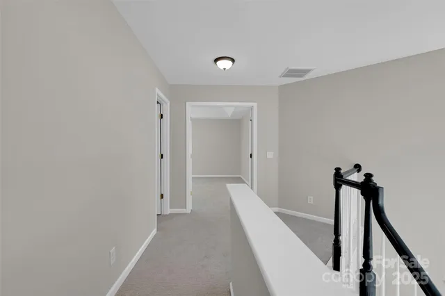 a view of a hallway with a small space