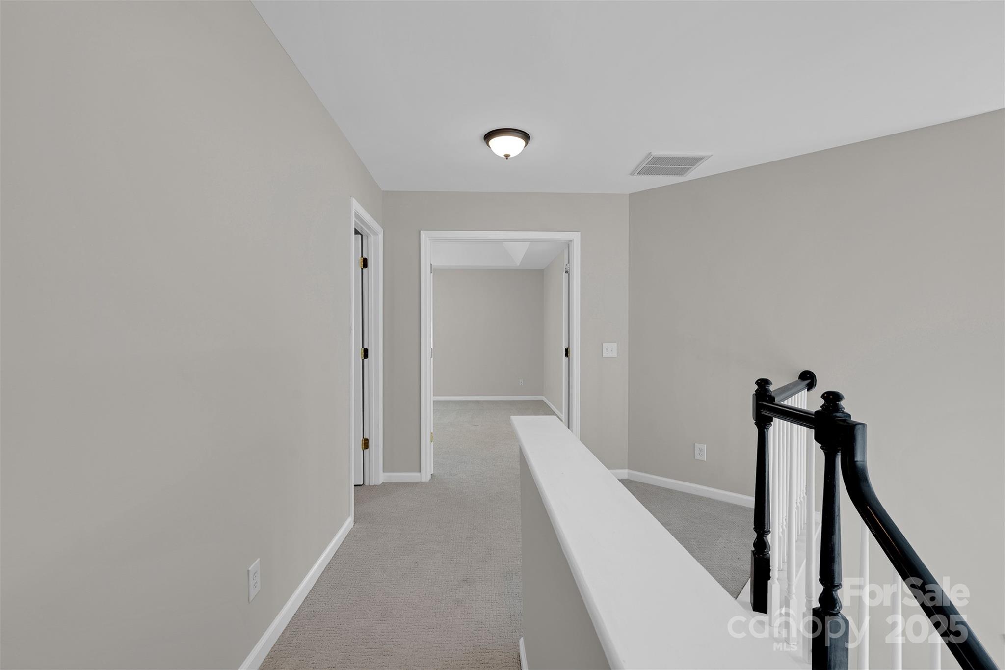 9211 Hickory Tree Lane Charlotte, NC 28277 - Photo 26 of 46 a view of a hallway with a small space